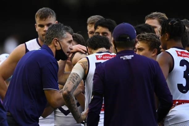 Dockers coach, Justin Longmuir talks to his players during the round 15 AFL match between the Collingwood Magpies and the Fremantle Dockers at Marvel...