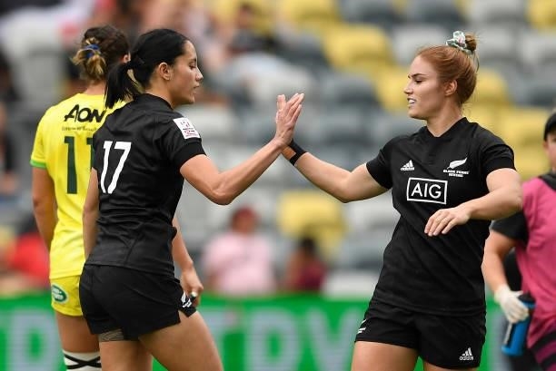 Shiray Tane of New Zealand celebrates after scoring a try with Michaela Blyde during the Oceania Sevens Challenge match between New Zealand and...