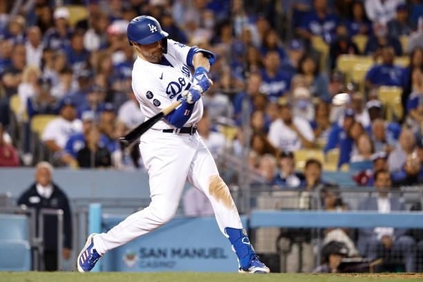 Pollock of the Los Angeles Dodgers hits a two run home run against the Chicago Cubs during the eighth inning at Dodger Stadium on June 25, 2021 in...