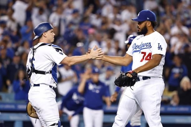 Kenley Jansen of the Los Angeles Dodgers celebrates with Will Smith of the Los Angeles Dodgers after defeating the Chicago Cubs, 6-2, during the...