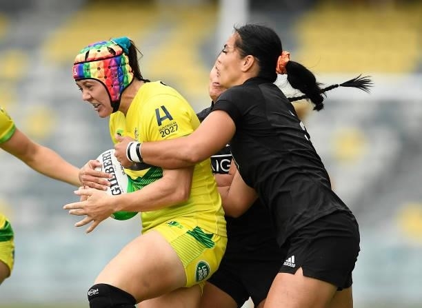 Sharni Williams of Australia is tackled during the Oceania Sevens Challenge match between New Zealand and Australia at Queensland Country Bank...
