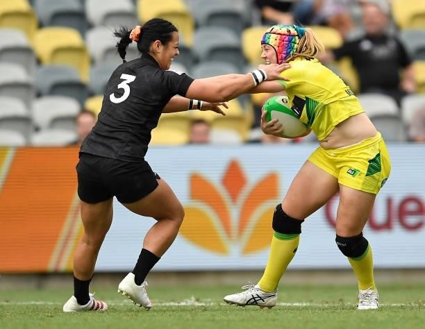 Sharni Williams of Australia is tackled by Stacey Waaka of New Zealand during the Oceania Sevens Challenge match between New Zealand and Australia at...