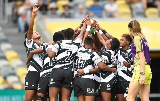 The Fijian team stands in a huddle before the start of the Oceania Sevens Challenge match between Fiji and Oceania at Queensland Country Bank Stadium...