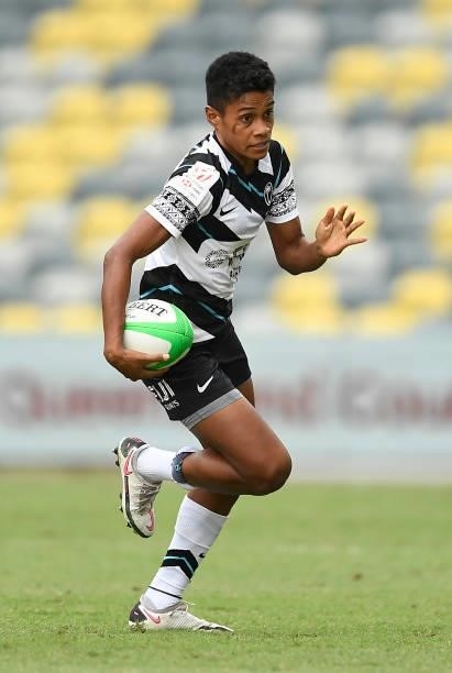 Sesenieli Donu of Fiji runs the ball during the Oceania Sevens Challenge match between Fiji and Oceania at Queensland Country Bank Stadium on June...