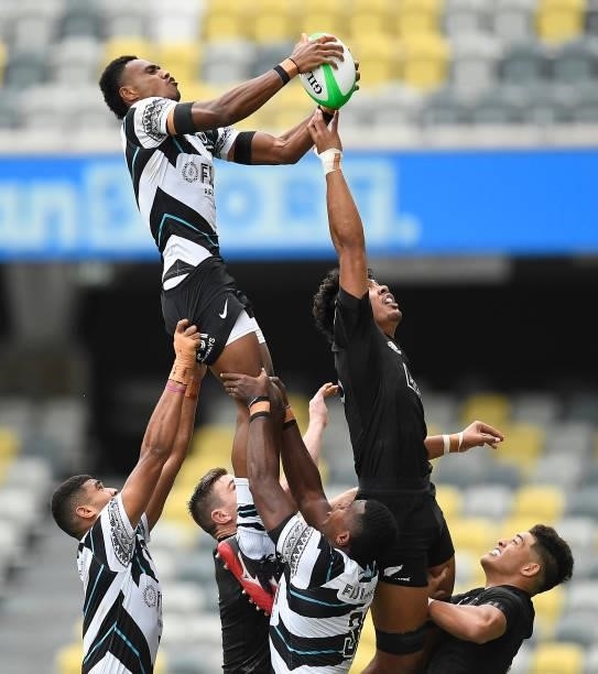Iosefo Masi of Fiji catches the ball in a line-out over Kitiona Vai of New Zealand during the Oceania Sevens Challenge match between New Zealand and...