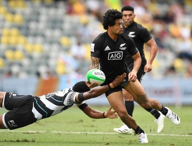Kitiona Vai of New Zealand passes the ball during the Oceania Sevens Challenge match between New Zealand and Fiji at Queensland Country Bank Stadium...