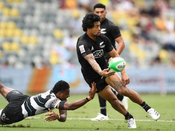 Kitiona Vai of New Zealand passes the ball during the Oceania Sevens Challenge match between New Zealand and Fiji at Queensland Country Bank Stadium...