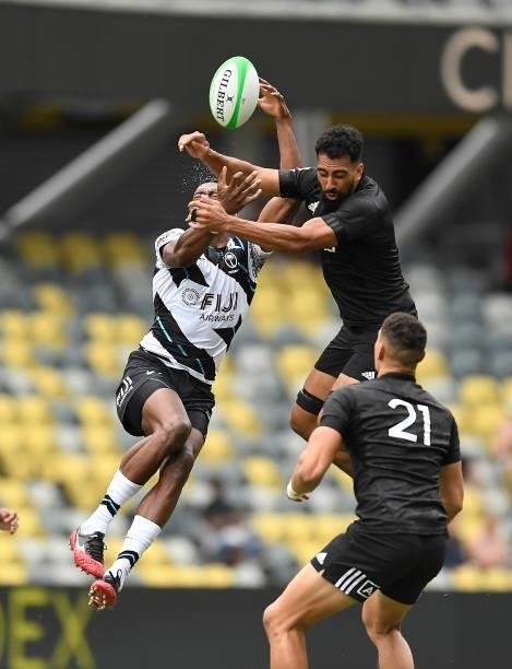 Amanaki Nicole of New Zealand contests the ball with Josefa Talacolo of Fiji during the Oceania Sevens Challenge match between New Zealand and Fiji...