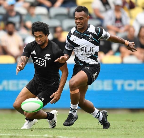 Regan Wear of New Zealand contest the ball with Sireli Maqala of Fiji during the Oceania Sevens Challenge match between New Zealand and Fiji at...