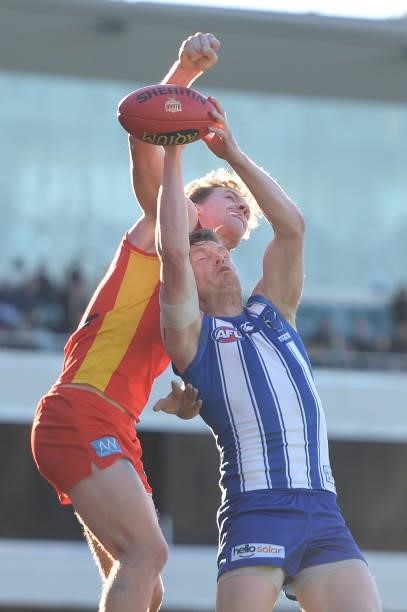 Jack Ziebell of the Kangaroos competes for the ball during the round 15 AFL match between the North Melbourne Kangaroos and the Gold Coast Suns at...