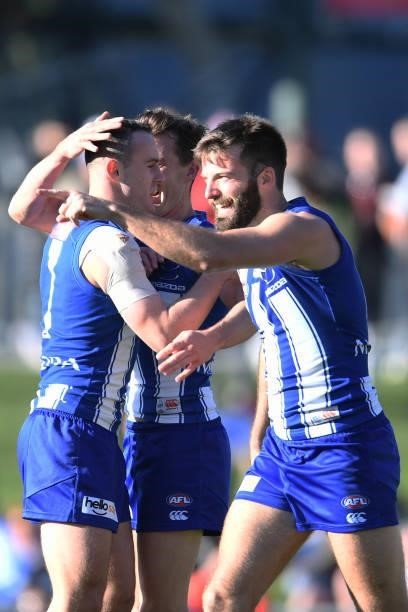 Jack Mahony of the Kangaroos celebrates a goal during the round 15 AFL match between the North Melbourne Kangaroos and the Gold Coast Suns at...