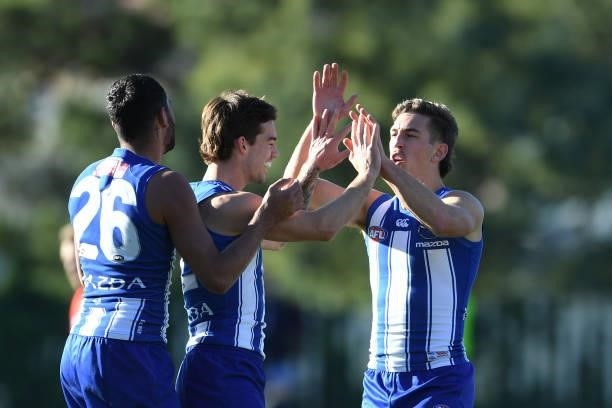 Jy Simpkin of the Kangaroos celebrates a goal during the round 15 AFL match between the North Melbourne Kangaroos and the Gold Coast Suns at...