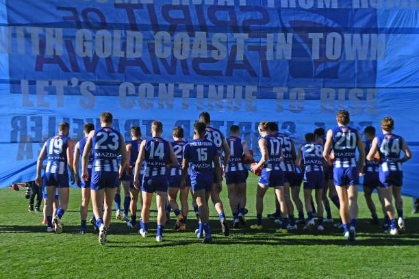 Kangaroos take the field during the round 15 AFL match between the North Melbourne Kangaroos and the Gold Coast Suns at Blundstone Arena on June 26,...