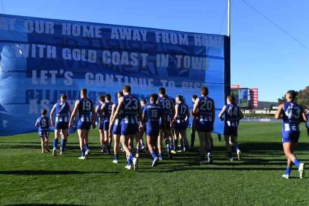 Kangaroos take the field during the round 15 AFL match between the North Melbourne Kangaroos and the Gold Coast Suns at Blundstone Arena on June 26,...