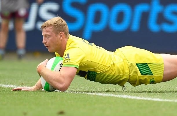 Lachlan Miller of Australia scores a try during the Oceania Sevens Challenge match between Australia and Oceania at Queensland Country Bank Stadium...