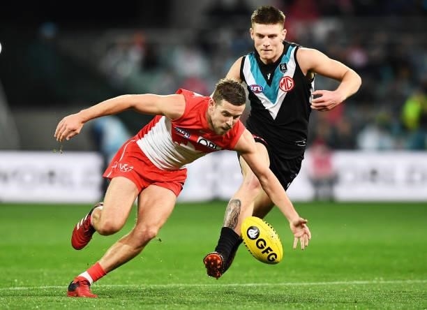 Jake Lloyd of the Swans competes with Dylan Williams of Port Adelaide during the round 15 AFL match between the Port Adelaide Power and the Sydney...