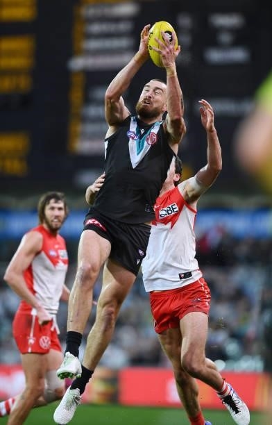 Charlie Dixon of Port Adelaide marks during the round 15 AFL match between the Port Adelaide Power and the Sydney Swans at Adelaide Oval on June 26,...