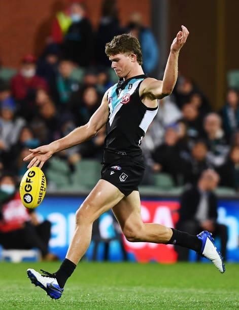 Mitch Georgiades of Port Adelaide kicks for goal during the round 15 AFL match between the Port Adelaide Power and the Sydney Swans at Adelaide Oval...