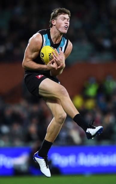 Mitch Georgiades of Port Adelaide marks during the round 15 AFL match between the Port Adelaide Power and the Sydney Swans at Adelaide Oval on June...