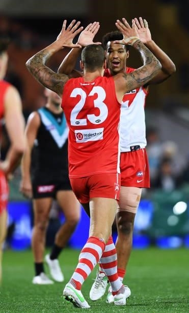 Lance Franklin of the Swans celebrates a goal with Joel Amartey of the Swans during the round 15 AFL match between the Port Adelaide Power and the...