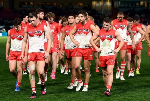 Dissapointed Sydney leave the griund after the round 15 AFL match between the Port Adelaide Power and the Sydney Swans at Adelaide Oval on June 26,...