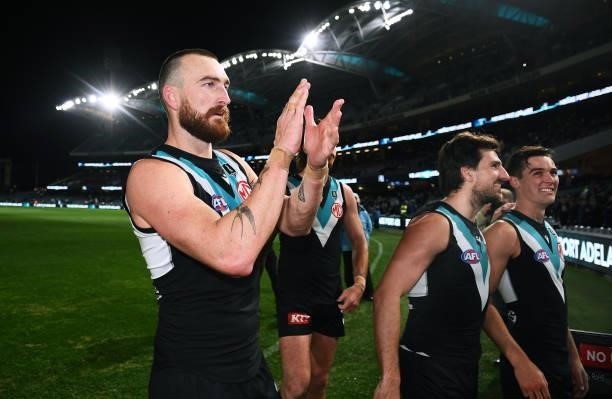 Charlie Dixon of Port Adelaide thanks the supporters as they leave the ground during the round 15 AFL match between the Port Adelaide Power and the...