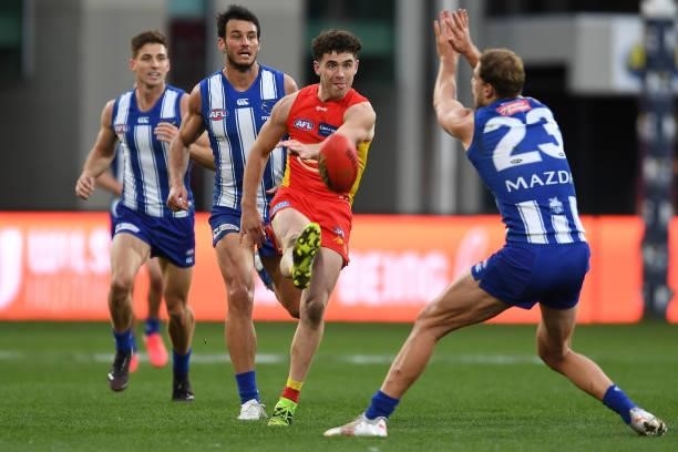 Sam Flanders of the Suns kicks the ball during the round 15 AFL match between the North Melbourne Kangaroos and the Gold Coast Suns at Blundstone...