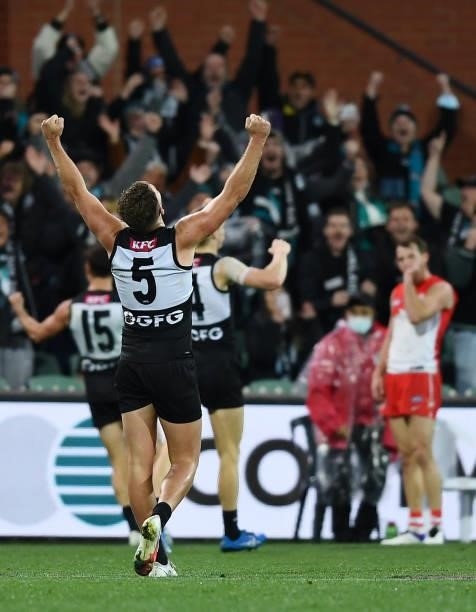 Dan Houston of Port Adelaide celebrates the final siren during the round 15 AFL match between the Port Adelaide Power and the Sydney Swans at...