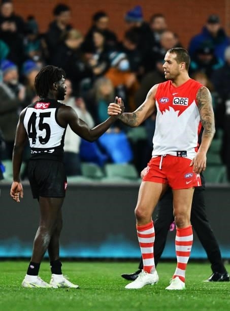 Martin Frederick of Port Adelaide shakes hands with Lance Franklin of the Swans at the end of the round 15 AFL match between the Port Adelaide Power...