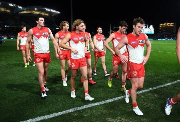 Sydney leave the ground after losing the round 15 AFL match between the Port Adelaide Power and the Sydney Swans at Adelaide Oval on June 26, 2021 in...