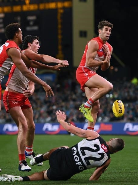 Josh Kennedy of the Swans over the top of Charlie Dixon of Port Adelaide during the round 15 AFL match between the Port Adelaide Power and the Sydney...