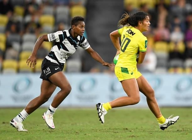 Sariah Paki of Australia looks to pass the ball during the Oceania Sevens Challenge match between Australia and Fiji at Queensland Country Bank...