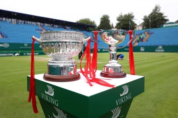 The mens and women's singles trophies are displayed court side prior to the finals during day 8 of the Viking International Eastbourne at Devonshire...