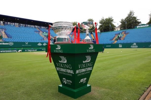 The mens and women's singles trophies are displayed court side prior to the finals during day 8 of the Viking International Eastbourne at Devonshire...