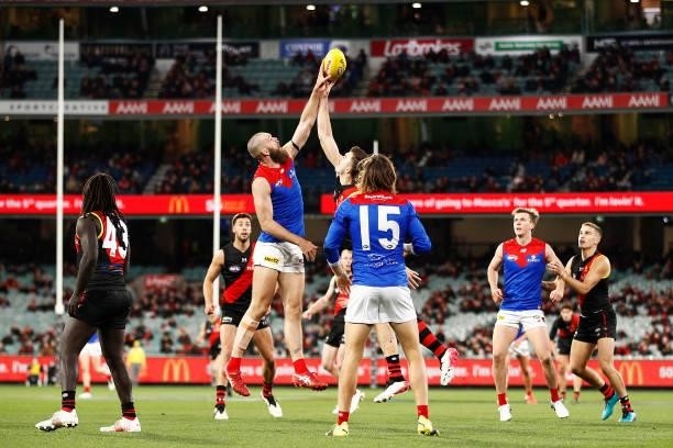 Max Gawn of the Demons and Sam Draper of the Bombers contest the ruck during the round 15 AFL match between the Essendon Bombers and the Melbourne...
