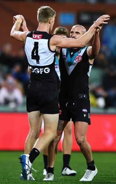 Todd Marshall of Port Adelaide celebrates a goal with Sam Powell-Pepper of Port Adelaide during the round 15 AFL match between the Port Adelaide...