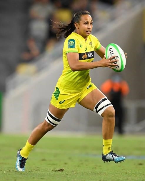 Cassandra Staples of Australia runs the ball during the Oceania Sevens Challenge match between Australia and Fiji at Queensland Country Bank Stadium...
