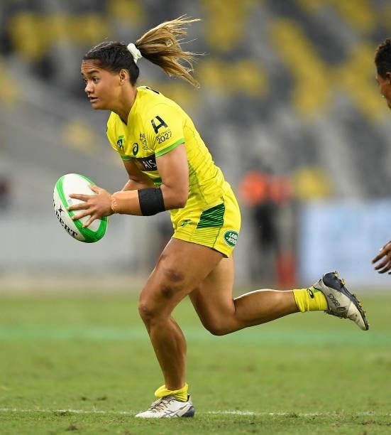 Faith Nathan of Australia runs the ball during the Oceania Sevens Challenge match between Australia and Fiji at Queensland Country Bank Stadium on...