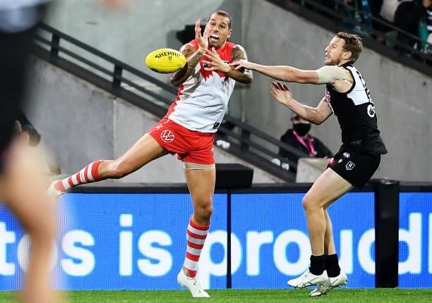 Lance Franklin of the Swans competes with Trent McKenzie of Port Adelaide during the round 15 AFL match between the Port Adelaide Power and the...