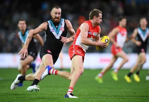 Harry Cunningham of the Swans competes with Charlie Dixon of Port Adelaide during the round 15 AFL match between the Port Adelaide Power and the...