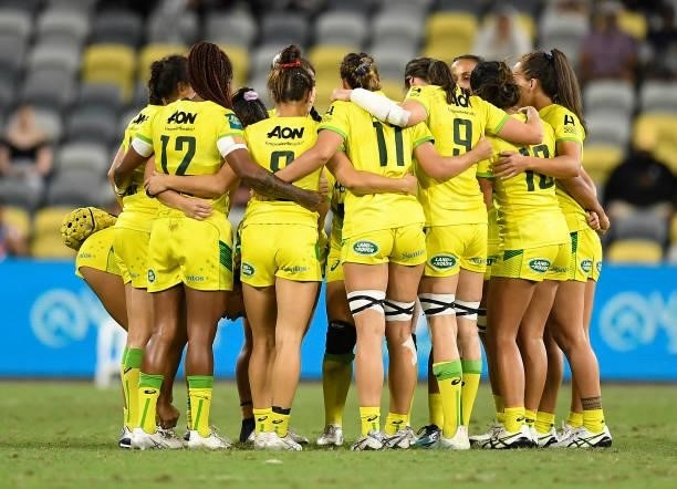 The Australian Team gathers in a huddle during the Oceania Sevens Challenge match between Australia and Fiji at Queensland Country Bank Stadium on...