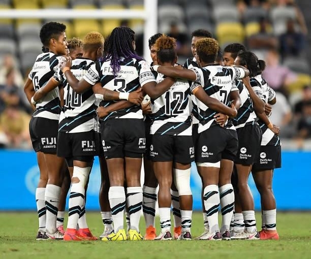 The Fijian team gathers in a huddle during the Oceania Sevens Challenge match between Australia and Fiji at Queensland Country Bank Stadium on June...