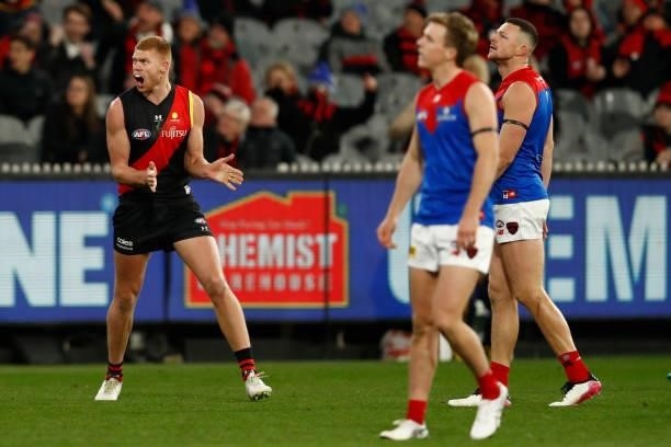 Peter Wright of the Bombers celebrates a goal during the round 15 AFL match between the Essendon Bombers and the Melbourne Demons at Melbourne...