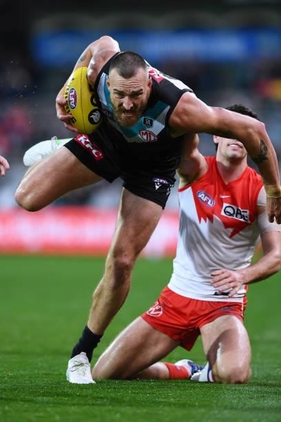Charlie Dixon of Port Adelaide marks during the round 15 AFL match between the Port Adelaide Power and the Sydney Swans at Adelaide Oval on June 26,...
