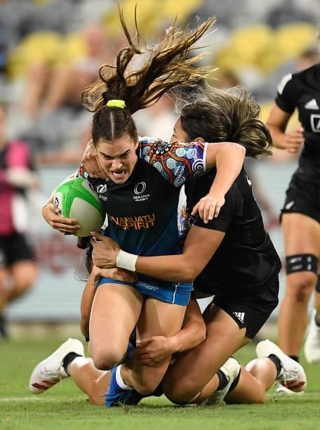 Jakiya Whitfeld of Oceania is tackled during the Oceania Sevens Challenge match between New Zealand and Oceania at Queensland Country Bank Stadium on...