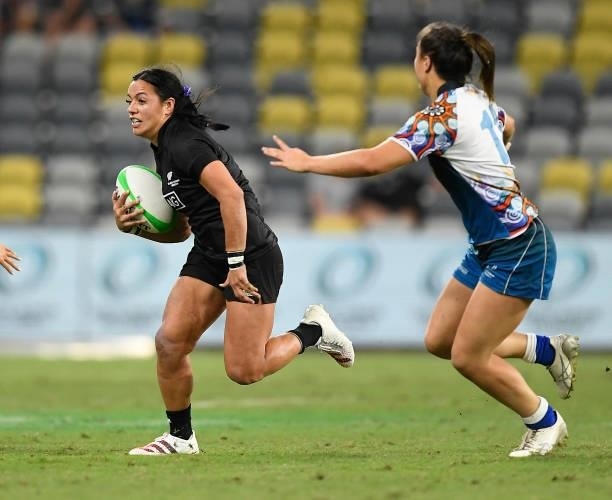 Stacey Waaka of New Zealand attempts to get past Bienne Terita of Oceania during the Oceania Sevens Challenge match between New Zealand and Oceania...