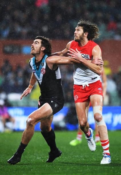 Scott Lycett of Port Adelaide rucks against Tom Hickey of the Swans during the round 15 AFL match between the Port Adelaide Power and the Sydney...