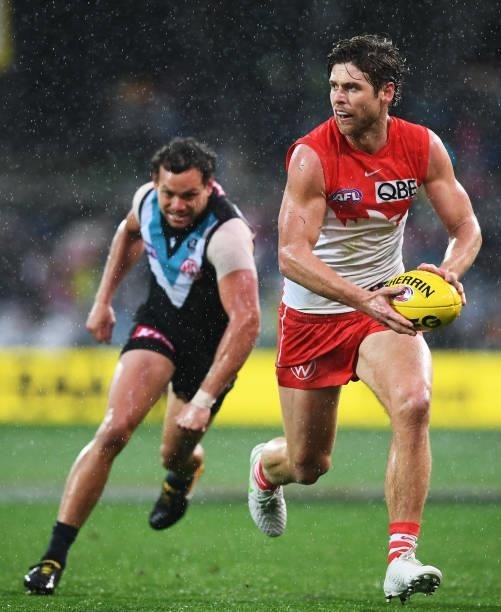Dane Rampe of the Swans gts away from Steven Motlop of Port Adelaide nduring the round 15 AFL match between the Port Adelaide Power and the Sydney...
