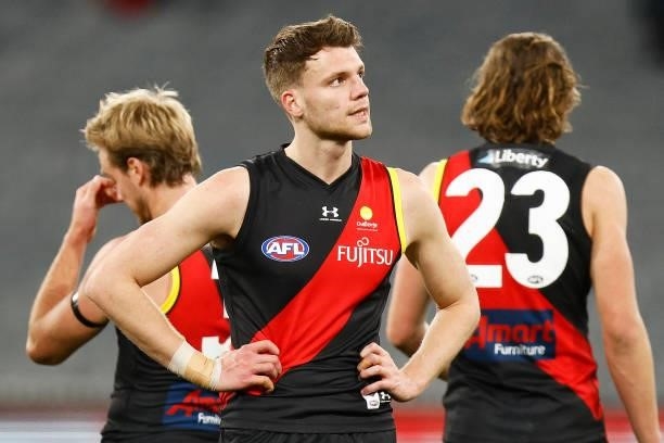 Jordan Ridley of the Bombers looks dejected after the round 15 AFL match between the Essendon Bombers and the Melbourne Demons at Melbourne Cricket...