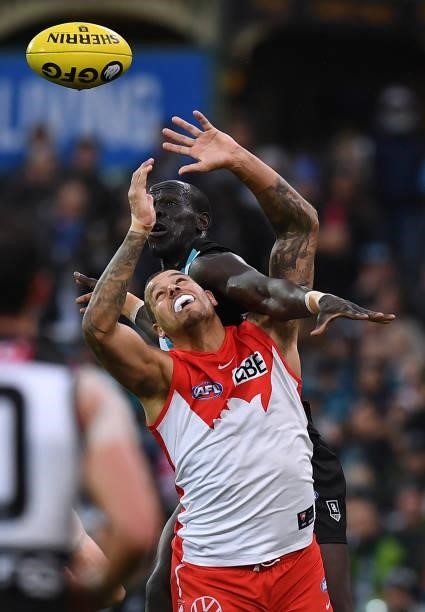 Lance Franklin of the Swans spoiled by Aliir Aliir of Port Adelaide during the round 15 AFL match between the Port Adelaide Power and the Sydney...